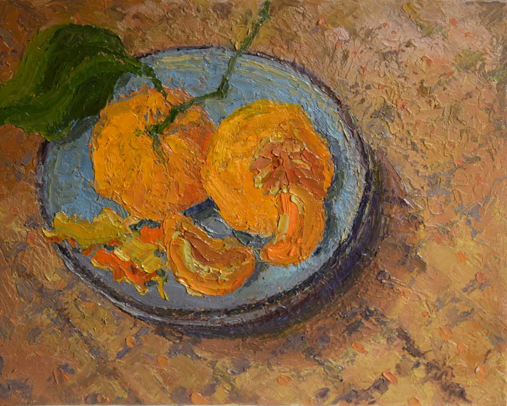 Tangerines on Blue Plate